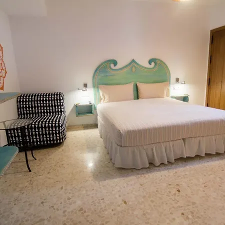 Casa Arco Iris Hostal *